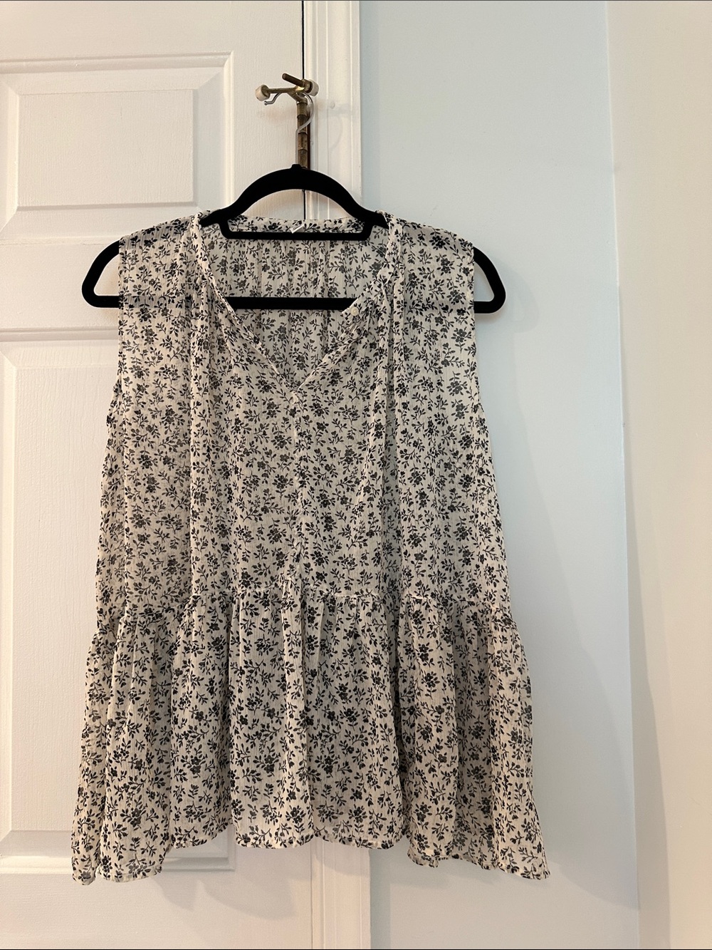 Uniqlo Cream and Black Floral Sleeveless Ruffle-Hem Top